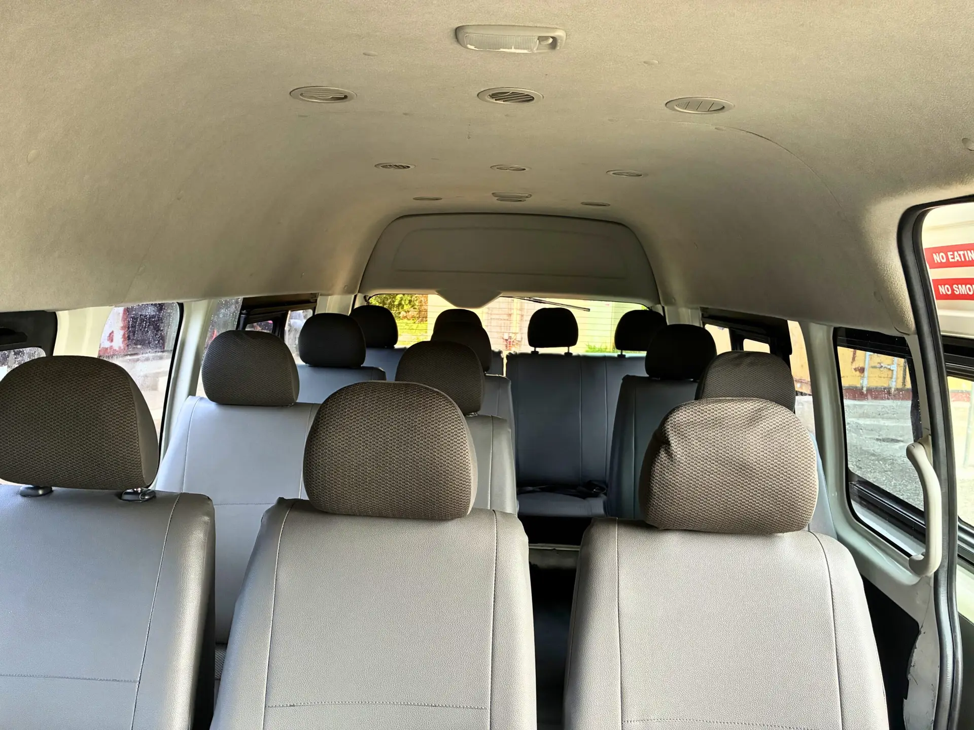 Side exterior of Toyota Hiace Tour Bus