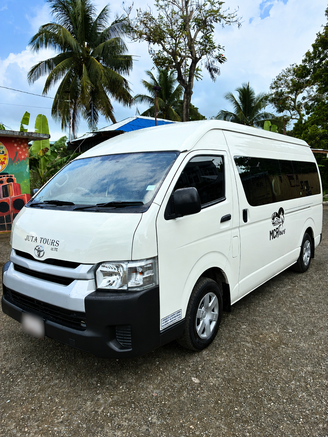 Front exterior of MCR Tours Toyota Hiace Tour and Excursion Bus